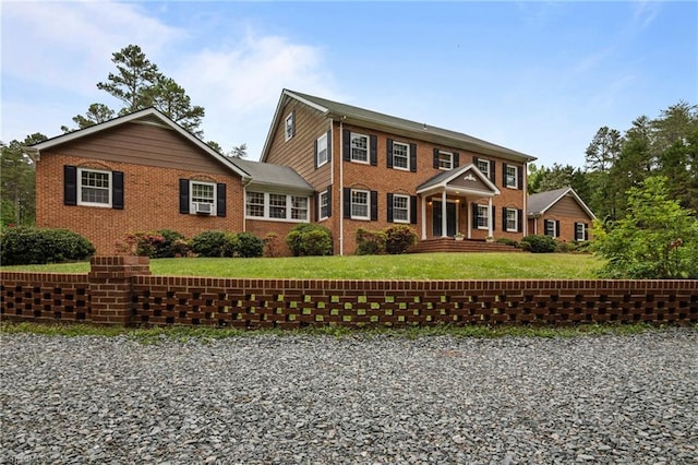 12088 Burlington Rd, Hurdle Mills, NC 27541 - view of front of house with a front lawn and brick siding