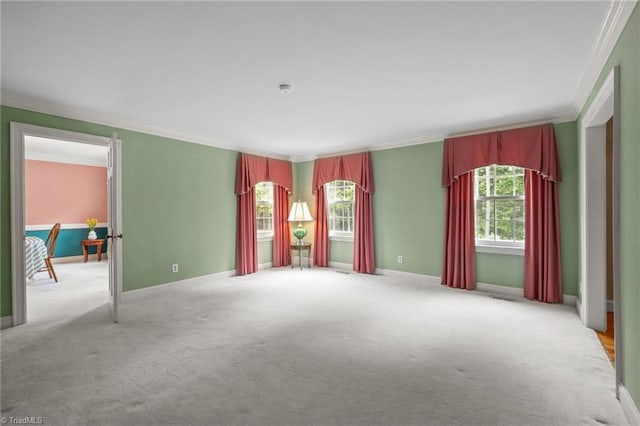 12088 Burlington Rd, Hurdle Mills, NC 27541 - empty room with crown molding, carpet floors, and baseboards