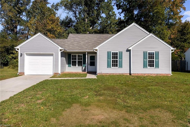 ranch-style house featuring a front yard and a garage