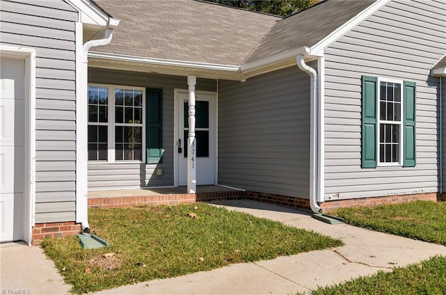 entrance to property with covered porch