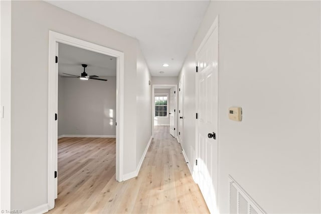 hallway featuring light hardwood / wood-style floors