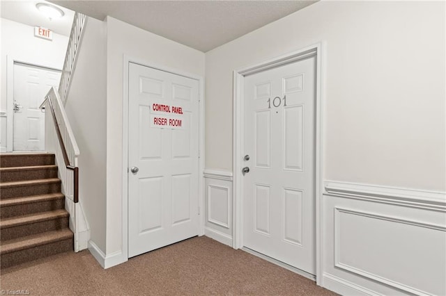 foyer with carpet