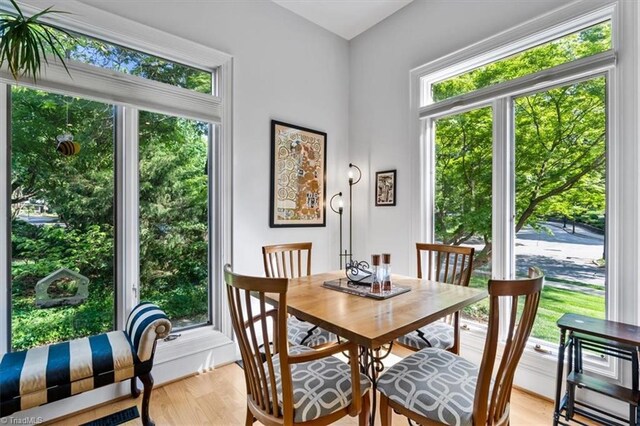 dining area with light wood-style flooring