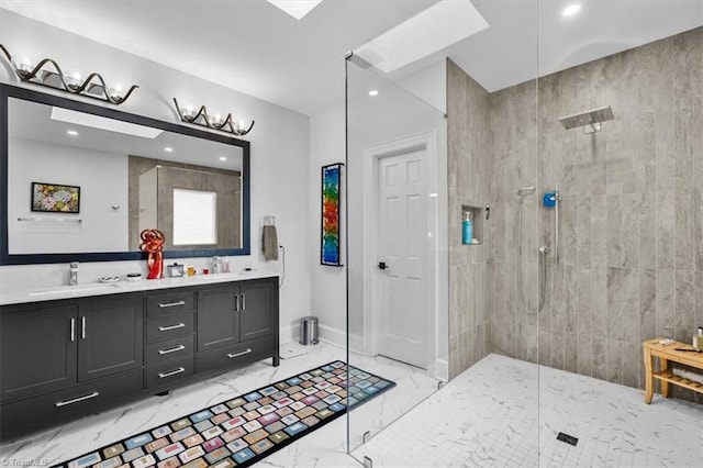 bathroom featuring a walk in shower, a sink, double vanity, marble finish floor, and recessed lighting