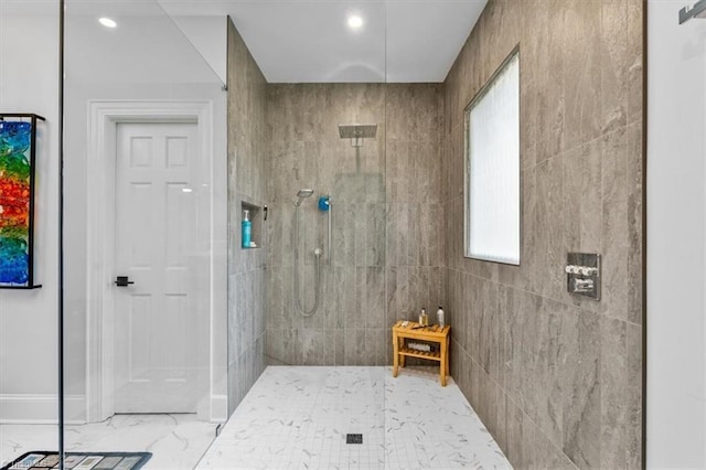 full bathroom with recessed lighting, marble finish floor, and a walk in shower