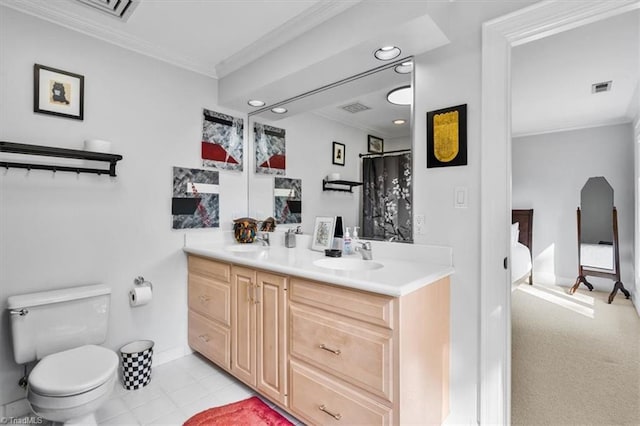full bathroom featuring crown molding, toilet, visible vents, and a sink