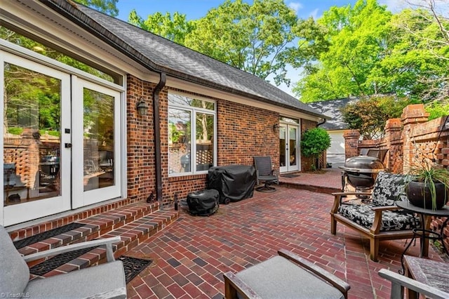 view of patio / terrace featuring grilling area and french doors