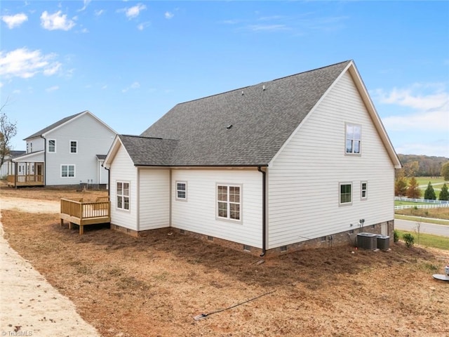 back of property featuring a deck