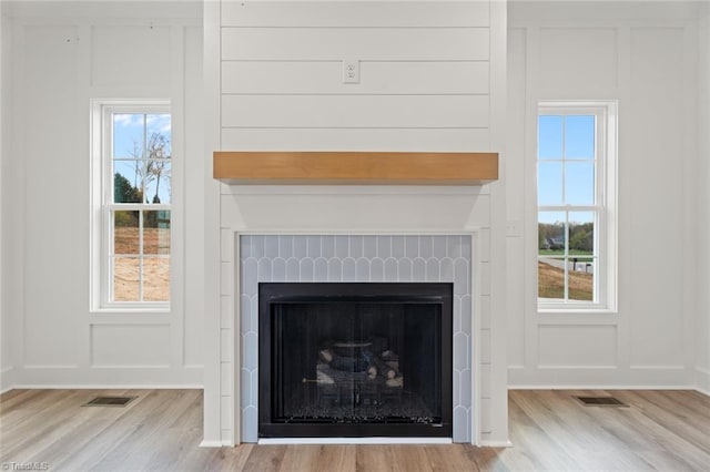 interior details featuring hardwood / wood-style flooring