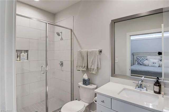 400 W 4th St Unit 401, Winston-Salem, NC 27101 - bathroom featuring vanity, toilet, ensuite bathroom, and a stall shower