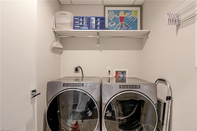 400 W 4th St Unit 401, Winston-Salem, NC 27101 - clothes washing area featuring washer and dryer and laundry area