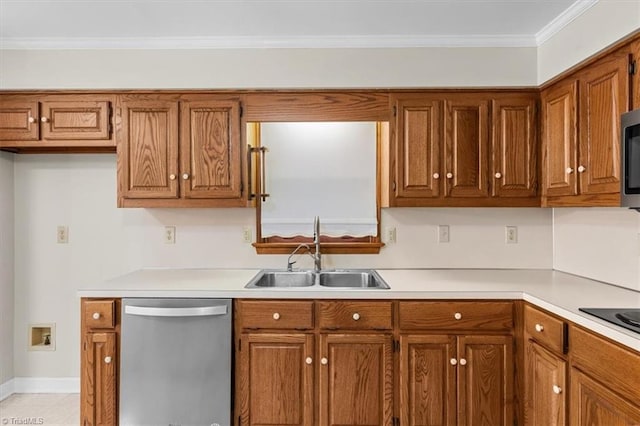 kitchen with appliances with stainless steel finishes, a sink, and brown cabinets