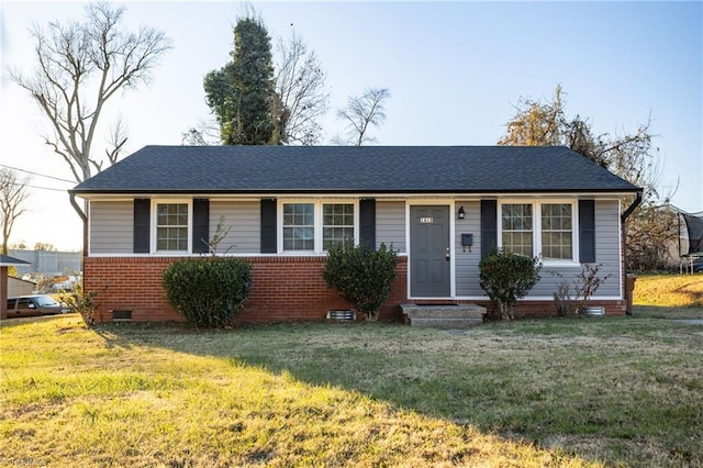 single story home with a front lawn