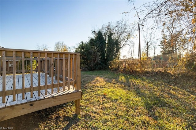 view of yard with a wooden deck