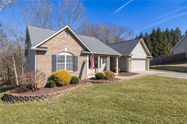 view of front of property with a garage and a front lawn