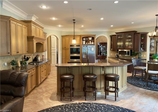 2863 Spencer Rd, Archdale, NC 27263 - kitchen featuring open shelves, appliances with stainless steel finishes, arched walkways, dark countertops, and tasteful backsplash