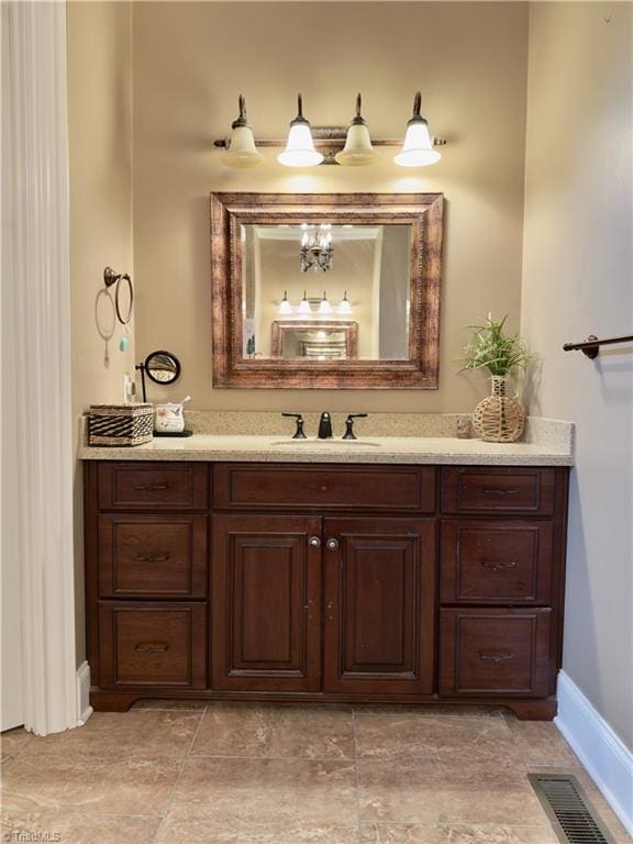 2863 Spencer Rd, Archdale, NC 27263 - bathroom featuring vanity and baseboards