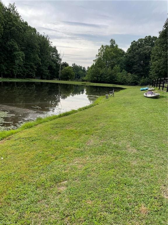 2863 Spencer Rd, Archdale, NC 27263 - water view featuring a heavily wooded area