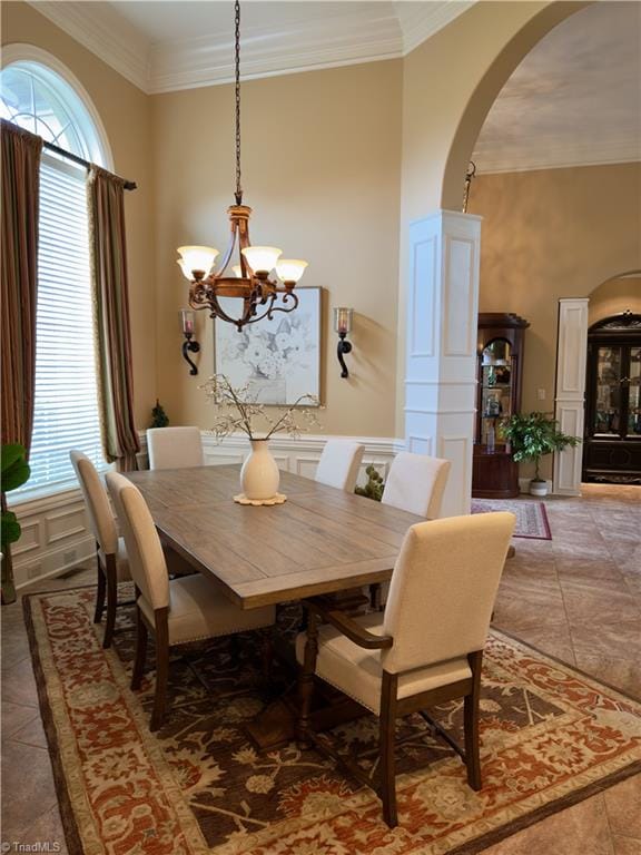2863 Spencer Rd, Archdale, NC 27263 - dining space featuring plenty of natural light, arched walkways, a chandelier, and crown molding