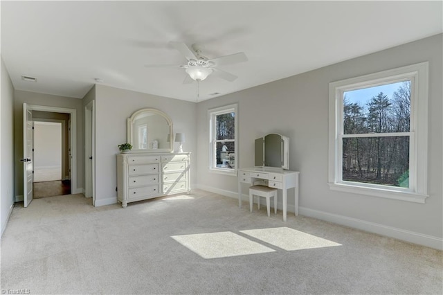 unfurnished bedroom featuring carpet, visible vents, and baseboards