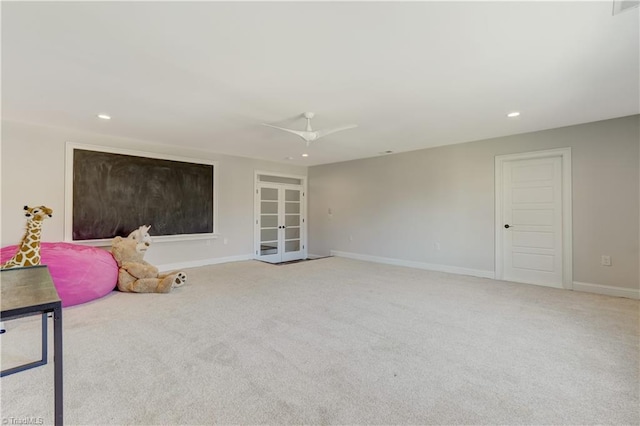 unfurnished room with baseboards, a ceiling fan, light colored carpet, french doors, and recessed lighting