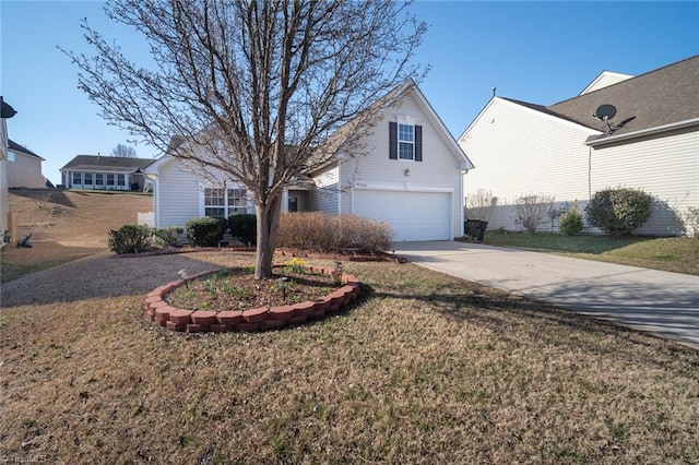 traditional home with concrete driveway, a garage, and a front yard