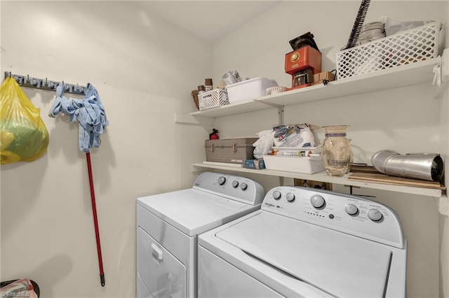 washroom with laundry area and separate washer and dryer