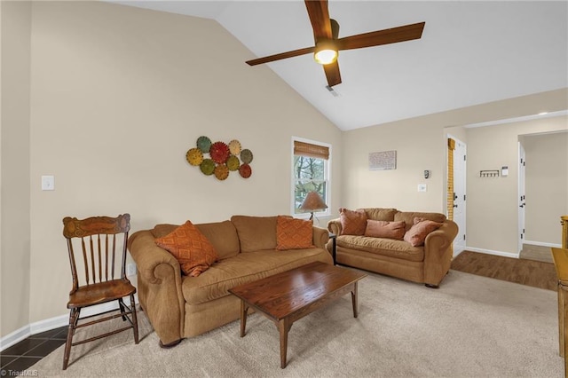 living room with high vaulted ceiling, baseboards, and a ceiling fan