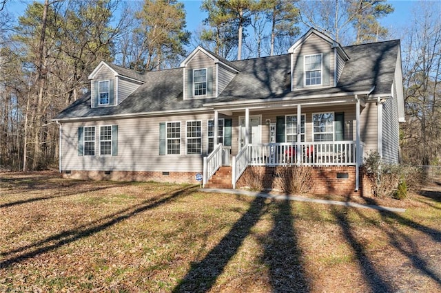 cape cod home with crawl space, a porch, a front lawn, and a shingled roof