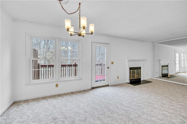 unfurnished living room featuring a textured ceiling, carpet flooring, a fireplace with flush hearth, and baseboards