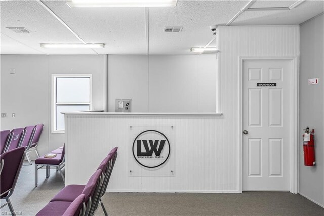 1255 Mountain View Rd, King, NC 27021 - interior space with visible vents, a textured ceiling, and carpet flooring