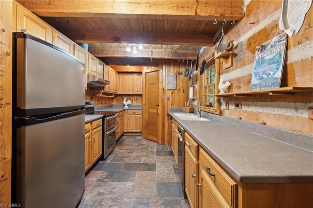 kitchen with dark tile patterned floors, stainless steel appliances, wood ceiling, sink, and beam ceiling