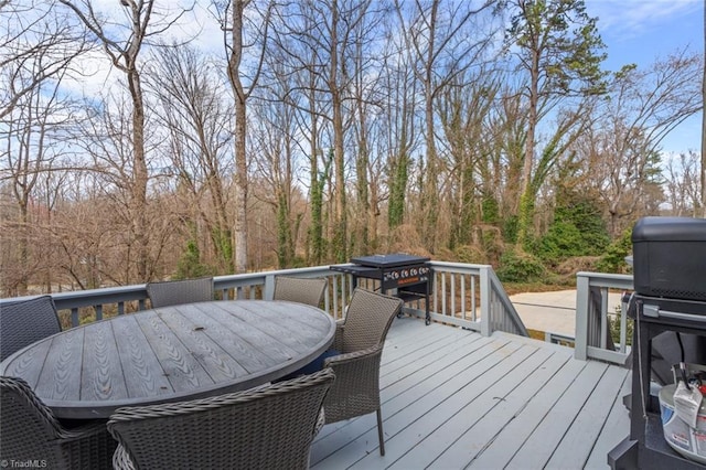 deck featuring outdoor dining space