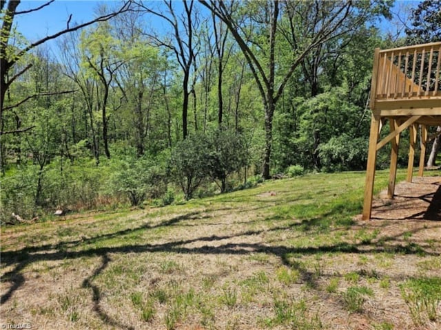 view of yard featuring a deck