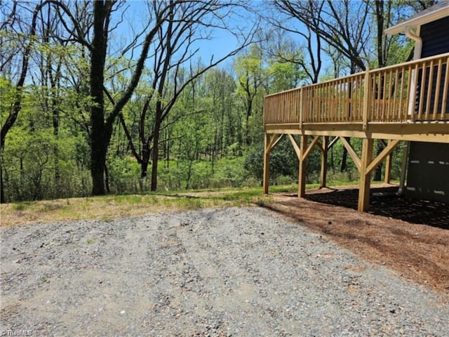 view of yard with a deck