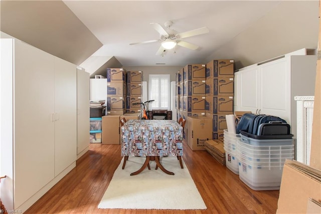 interior space featuring ceiling fan and wood-type flooring