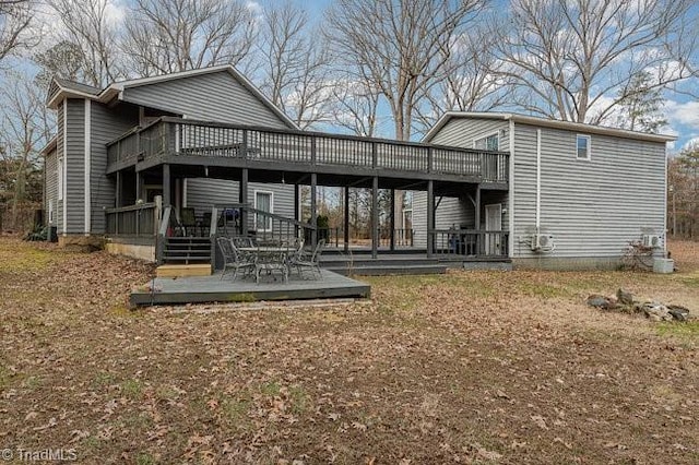 rear view of house with a deck