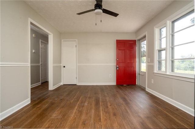 4362 Parsonsville Rd, Purlear, NC 28665 - spare room featuring wood finished floors, baseboards, a textured ceiling, and ceiling fan