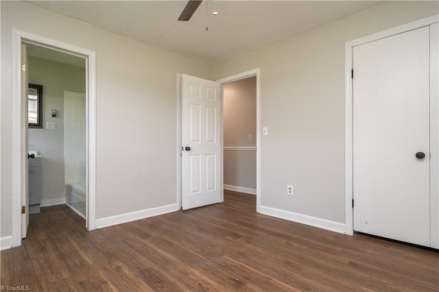 4362 Parsonsville Rd, Purlear, NC 28665 - unfurnished bedroom with wood finished floors, baseboards, and ceiling fan