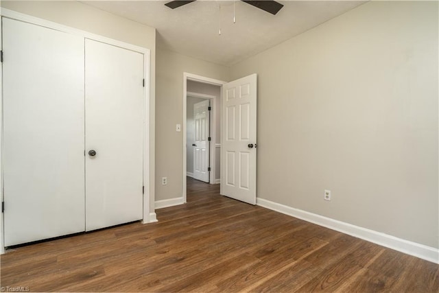 4362 Parsonsville Rd, Purlear, NC 28665 - unfurnished bedroom featuring wood finished floors, baseboards, ceiling fan, and a closet