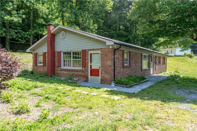 4362 Parsonsville Rd, Purlear, NC 28665 - ranch-style home with brick siding, a front lawn, and a chimney