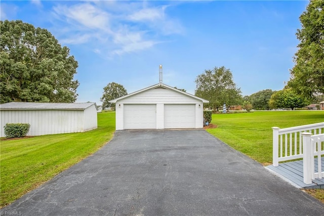 garage with a yard