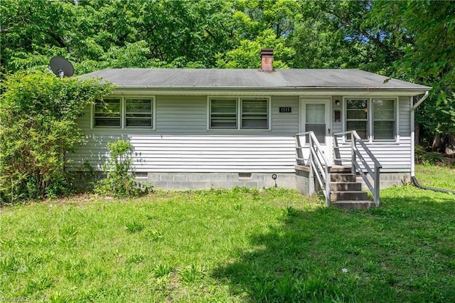 1515 Tucker St, Greensboro, NC 27405 - view of front of home featuring a chimney, a front lawn, and crawl space