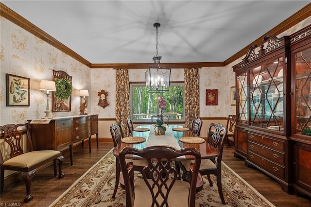 dining space with ornamental molding, dark wood-style flooring, and wallpapered walls