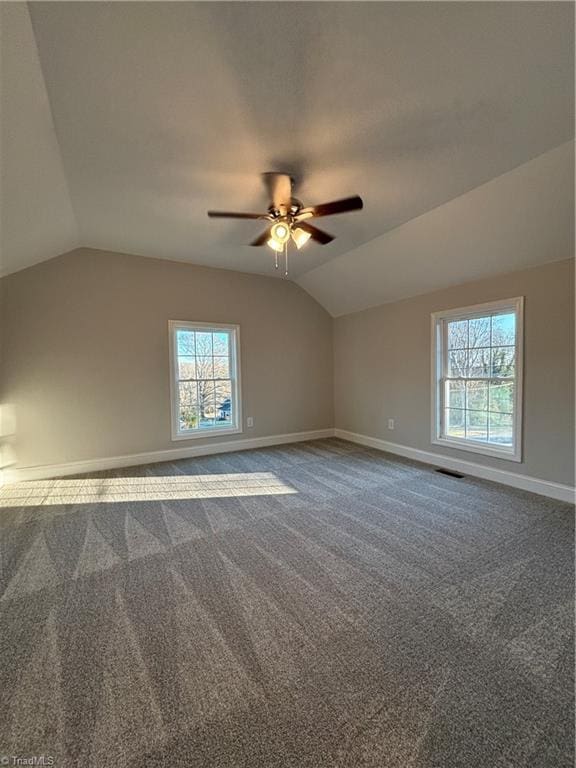 bonus room with carpet flooring, ceiling fan, and lofted ceiling