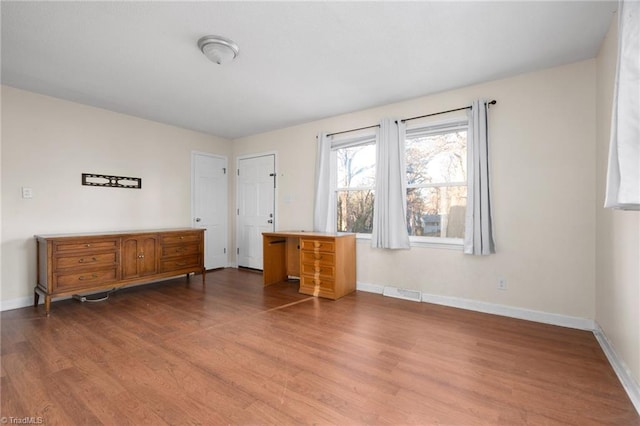 bedroom featuring hardwood / wood-style floors