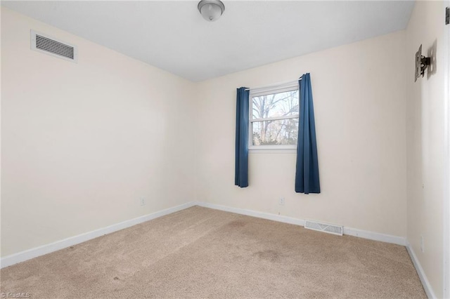 unfurnished room with carpet floors