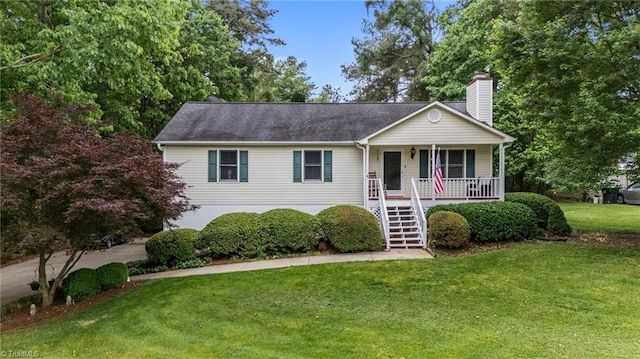view of front of house with stairs, a porch, a chimney, and a front lawn