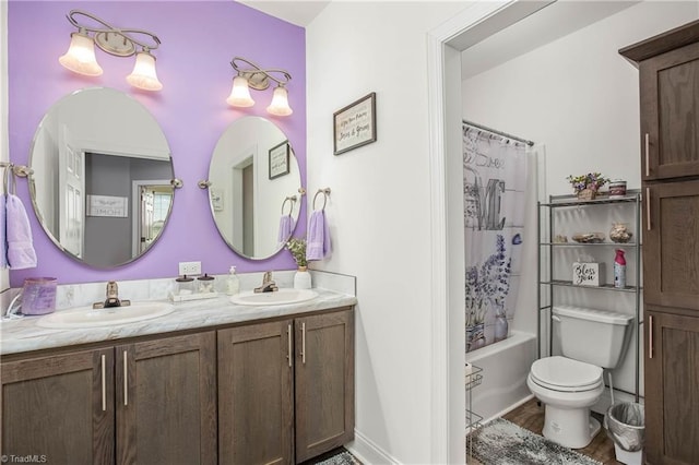 724-0 Tom Cook Rd, Pilot Mountain, NC 27041 - bathroom featuring double vanity, wood finished floors, and shower / bath combo with shower curtain