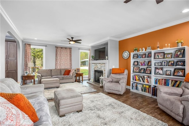 724-0 Tom Cook Rd, Pilot Mountain, NC 27041 - living room with ceiling fan, plenty of natural light, wood finished floors, crown molding, and arched walkways
